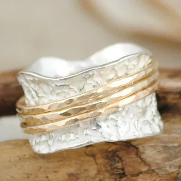 Bague à spinner vintage en or et argent