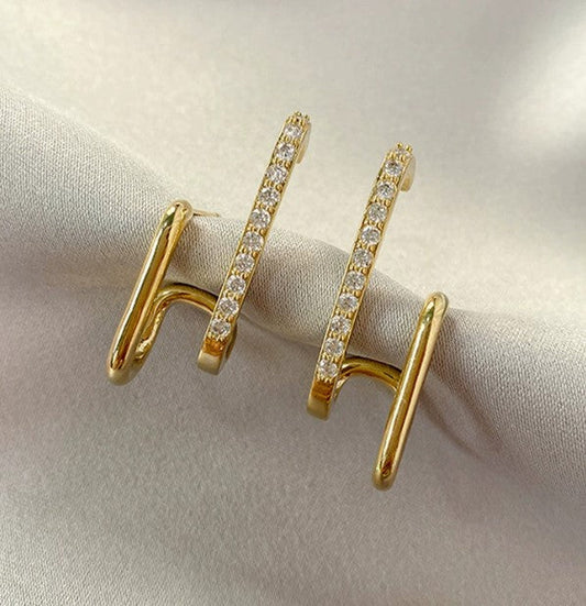 Boucles d'oreilles en or 18K avec cristaux en griffe