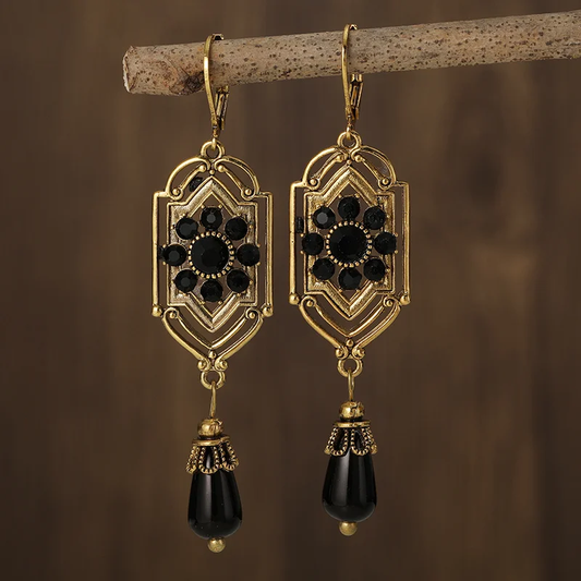 Boucles d'oreilles vintage avec cristaux noirs suspendus
